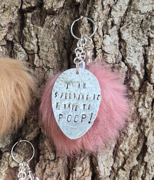 Pompom keychains "I'm speeding...."